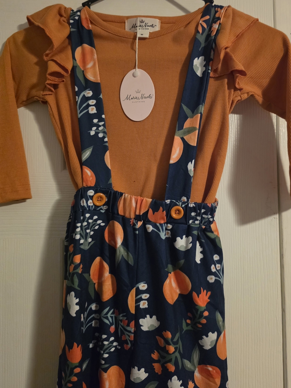 Marie Nicole Orange Ribbed Ruffle Top with Navy Floral Suspender Pants